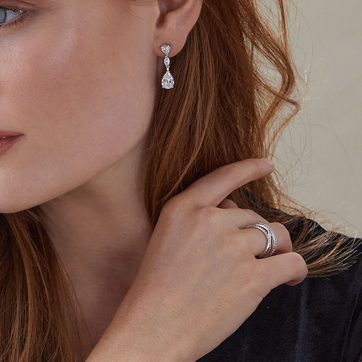 Luminous Silver Crossover Band Ring