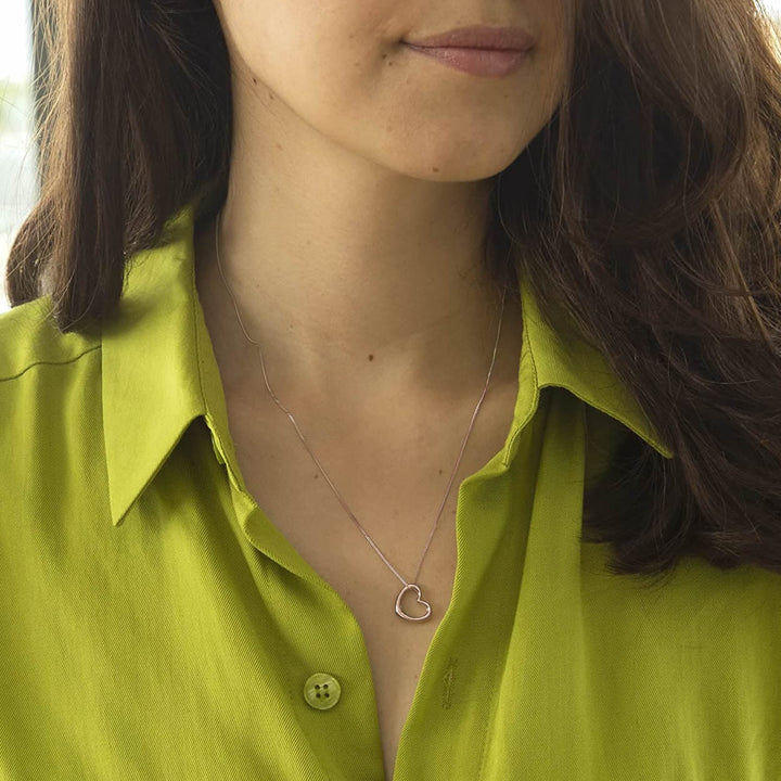 Rose gold open heart pendant