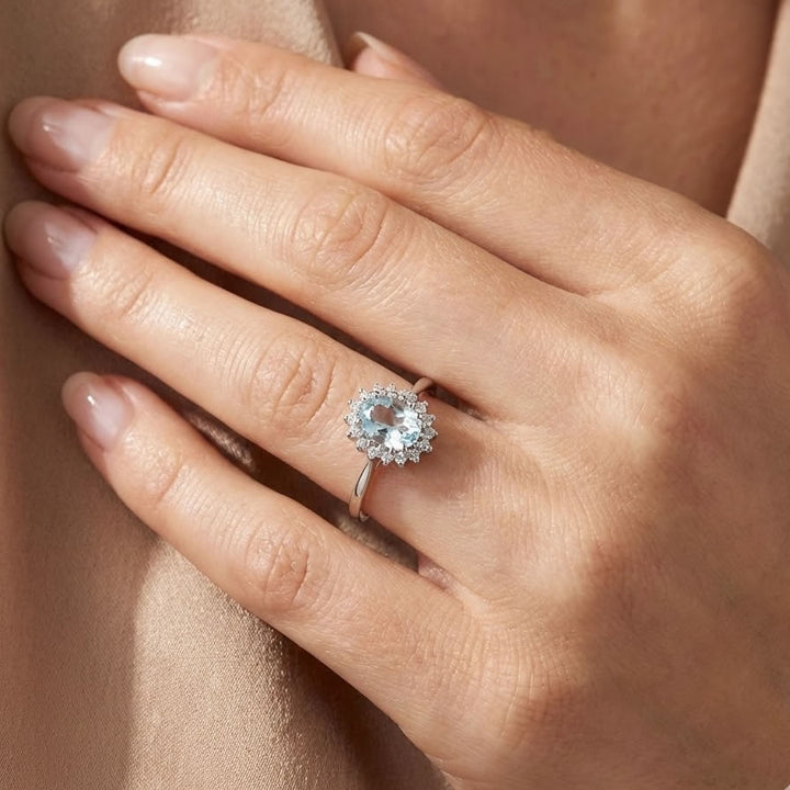 9ct White Gold Aquamarine & Diamond Oval Cluster Ring
