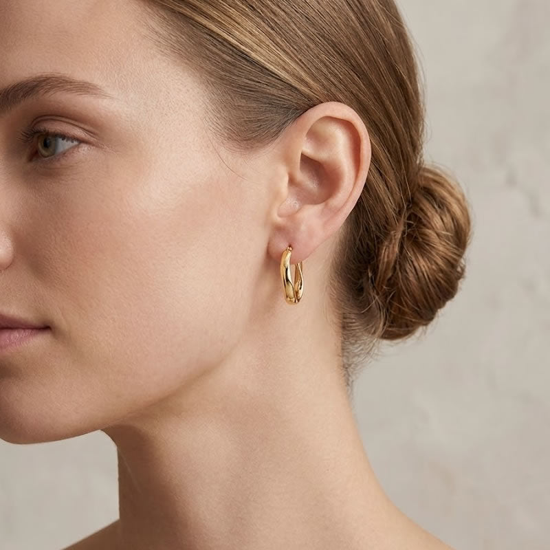 9ct Gold Oval Twist Creole Hoop Earrings