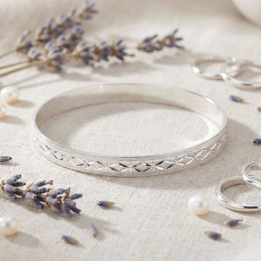 Silver Solid Round Diamond Cut Bangle