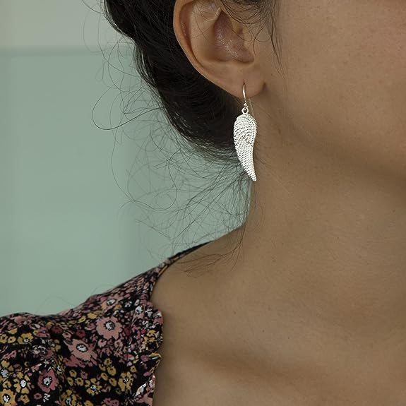 Sterling silver wing on sale earrings