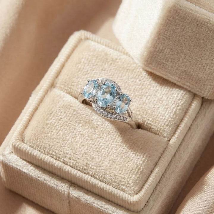 9ct White Gold Diamond & Aquamarine Twist Ring